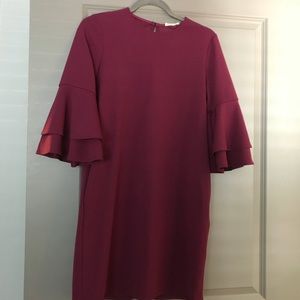 Magenta dress with 3/4 length ruffle sleeves